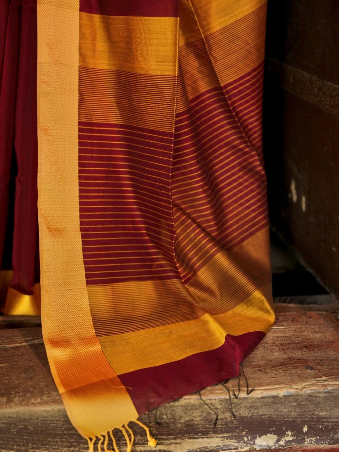 Maroon and yellow maheshwari with resham border
