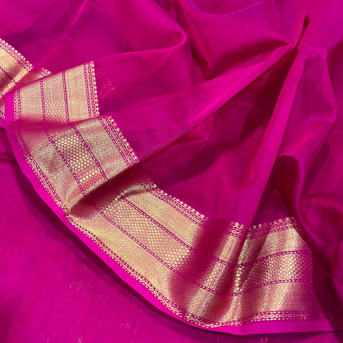 Rani pink Maheshwari saree with zari border