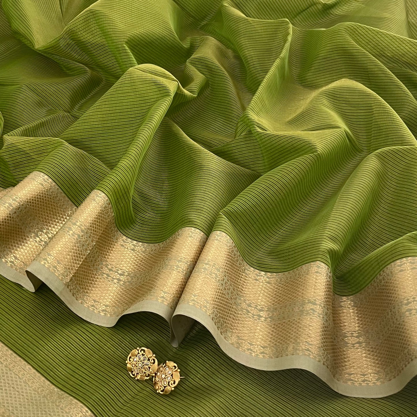 Moss green Maheshwari saree with zari border