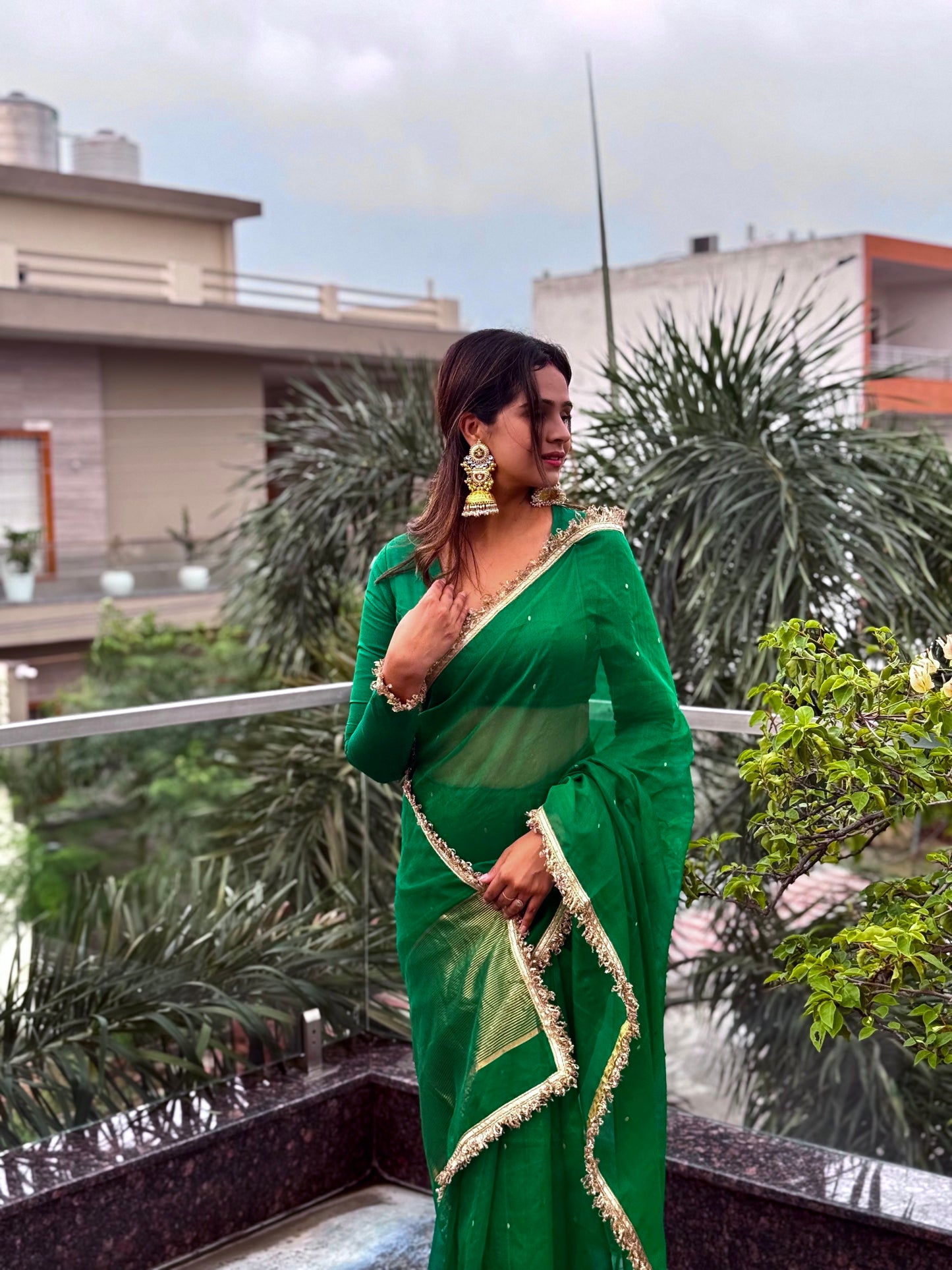 Emerald Green Chanderi silk saree with zari bootis all over