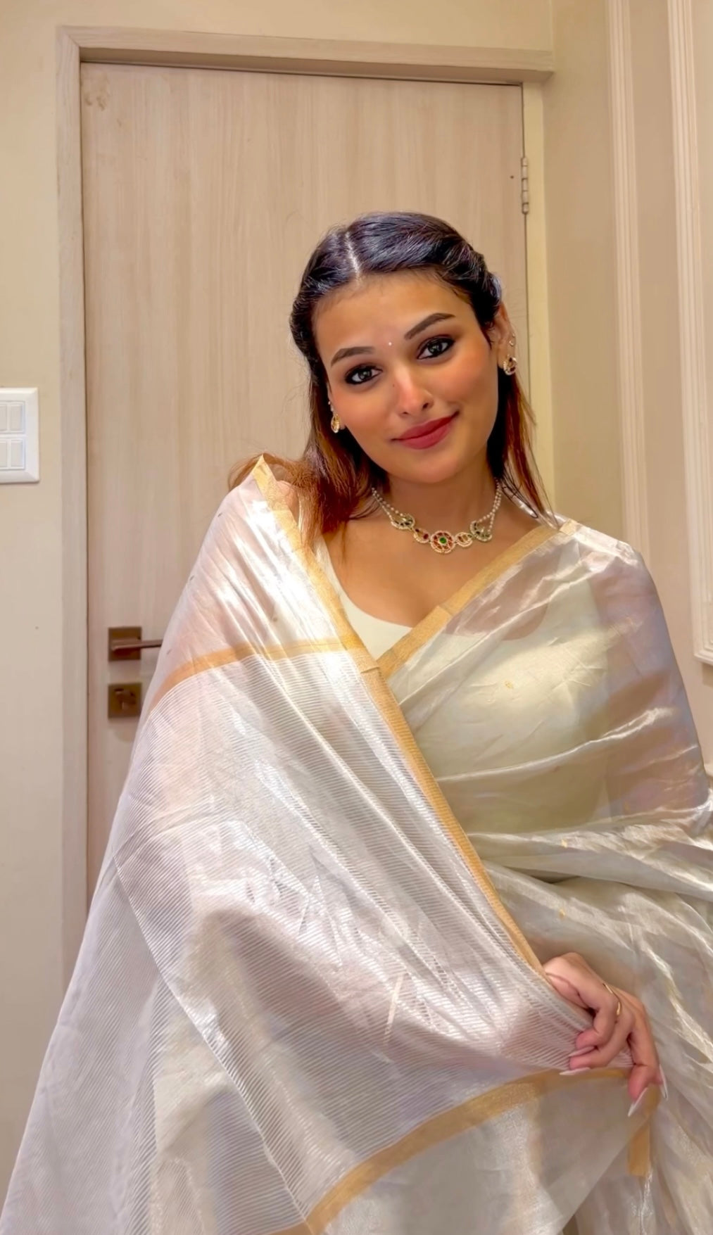 Chantilly cream Chanderi tissue silk saree with zari bootis all over