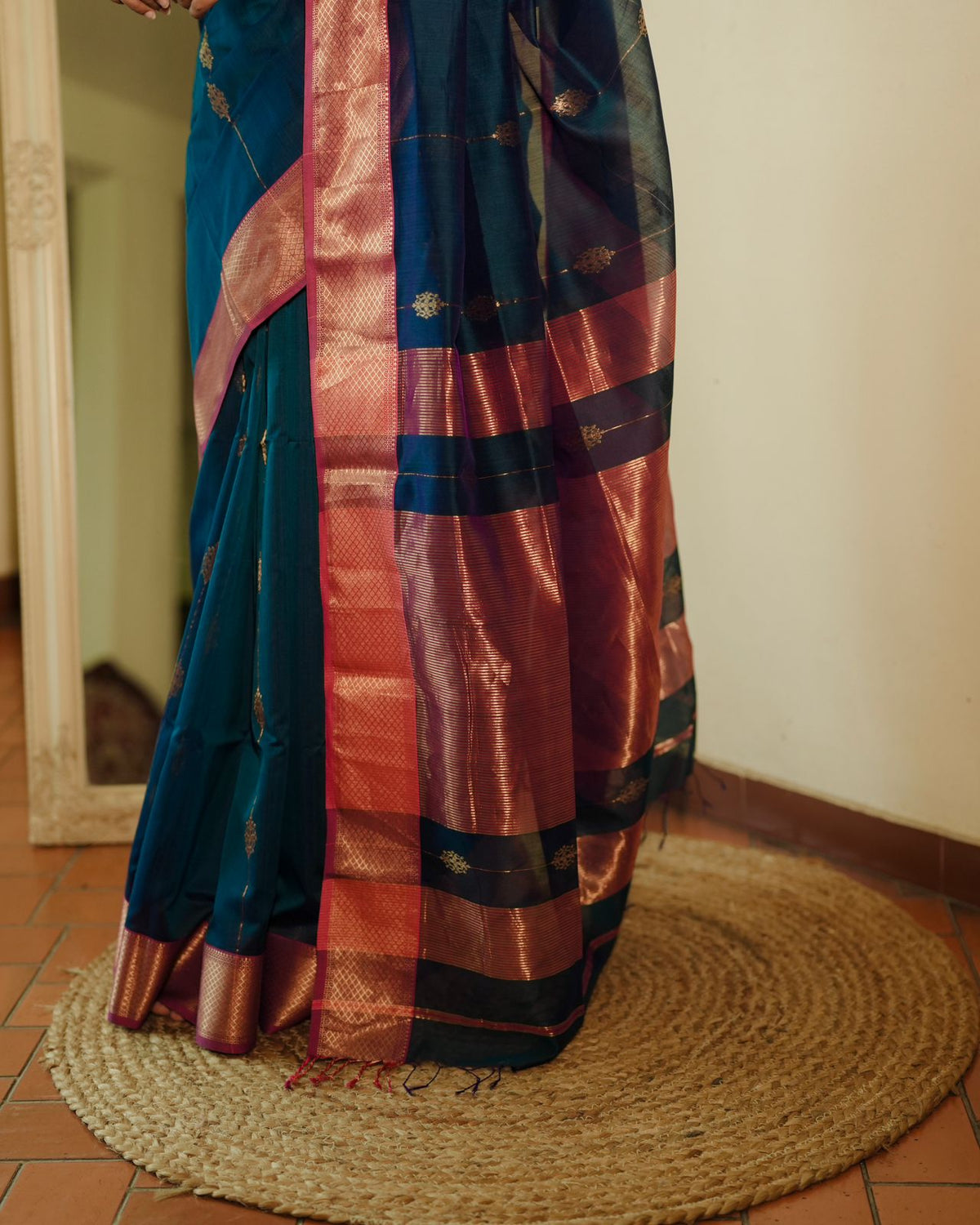 Peacock blue and pink Maheshwari saree with zari motifs all over