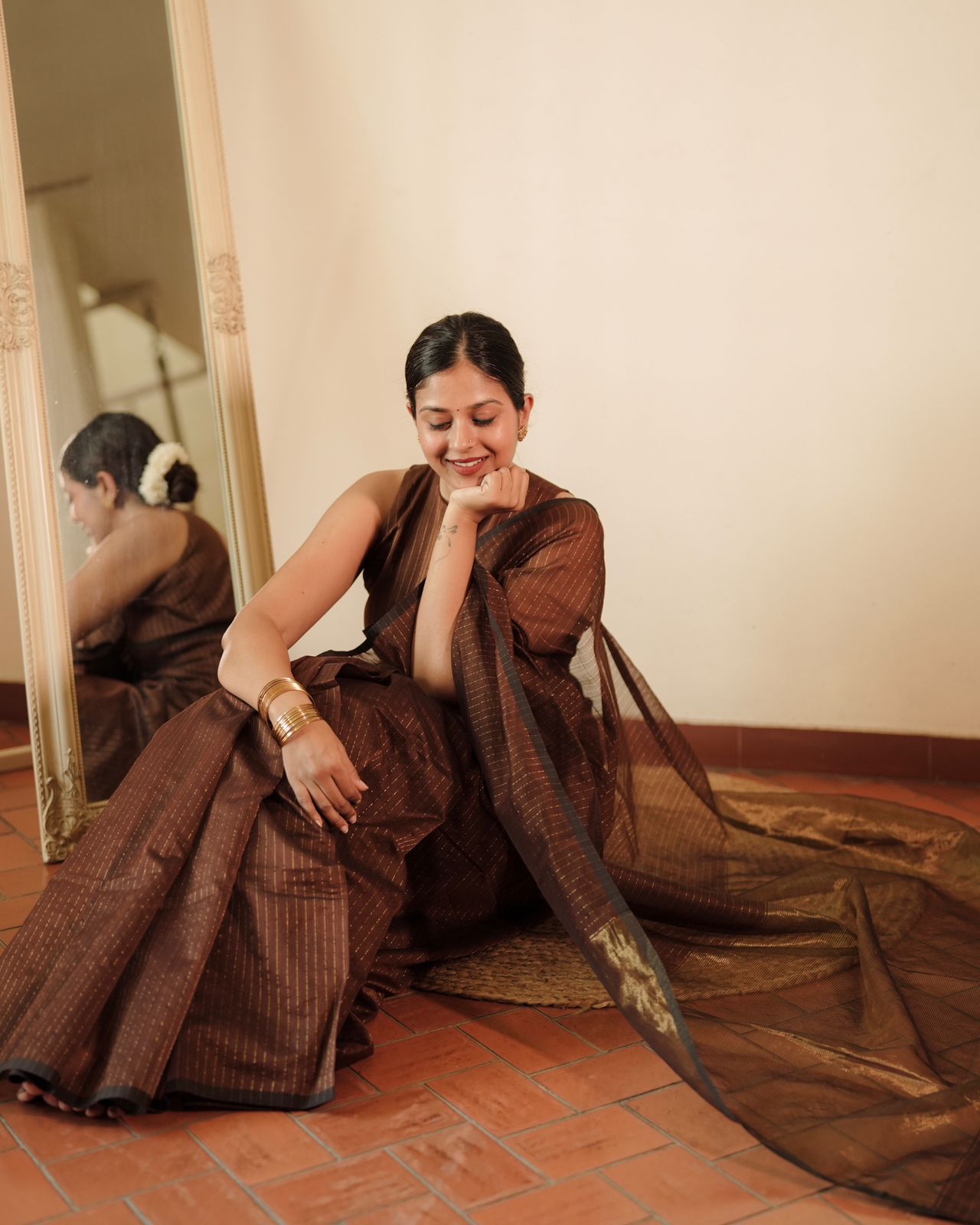 Chocolate brown Maheshwari saree with zari lines all over