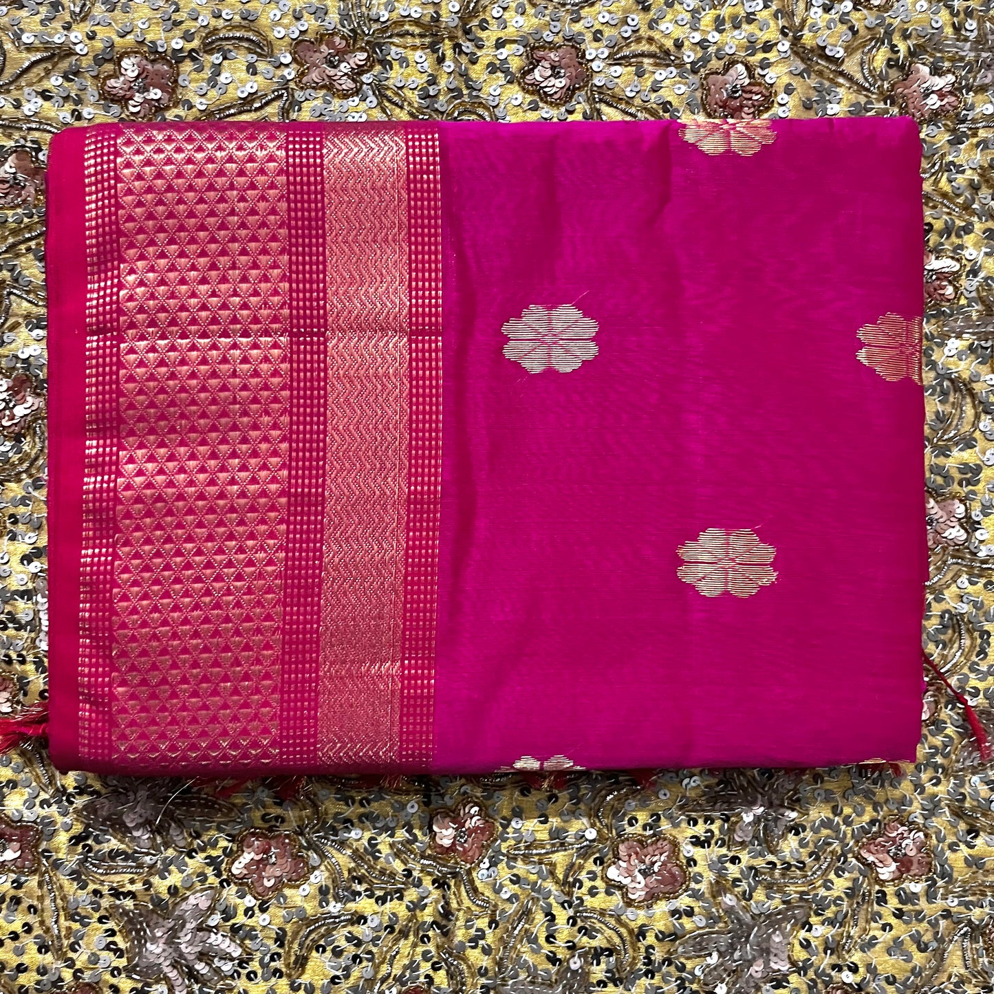 Pink Maheshwari saree with flower bootis all over