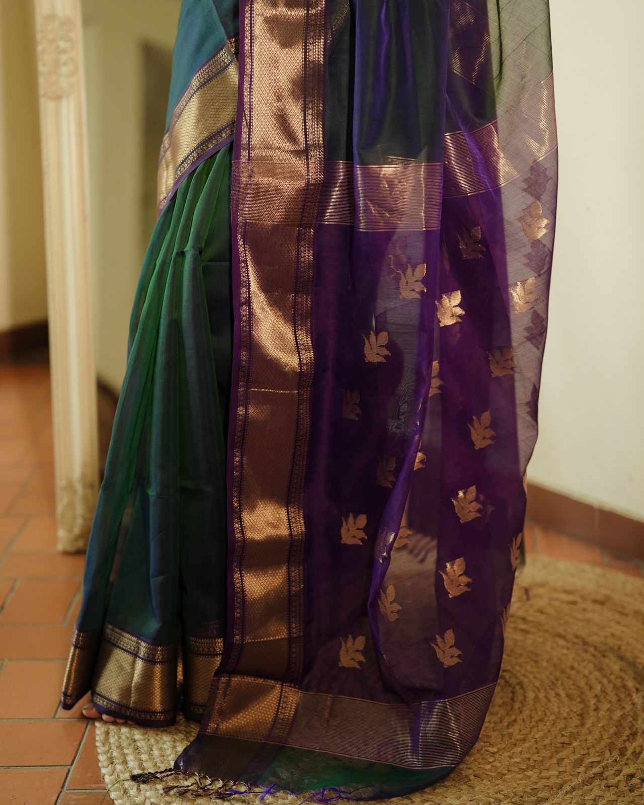 Peacock and purple dual tone Maheshwari saree with flower motifs on pallu
