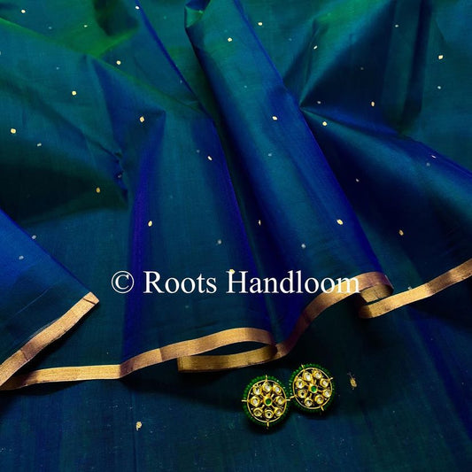 Peacock blue and green dual tone Chanderi organza silk saree with zari bootis all over