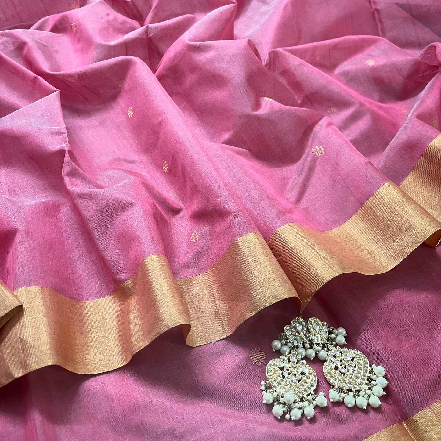 Rose pink Chanderi saree with zari bootis all over and flower motifs on pallu