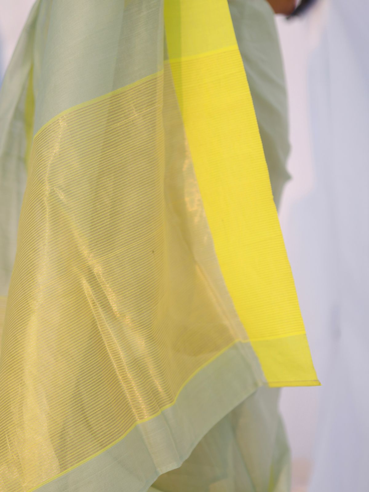 Sage and lemon Chanderi saree with zari lines on pallu