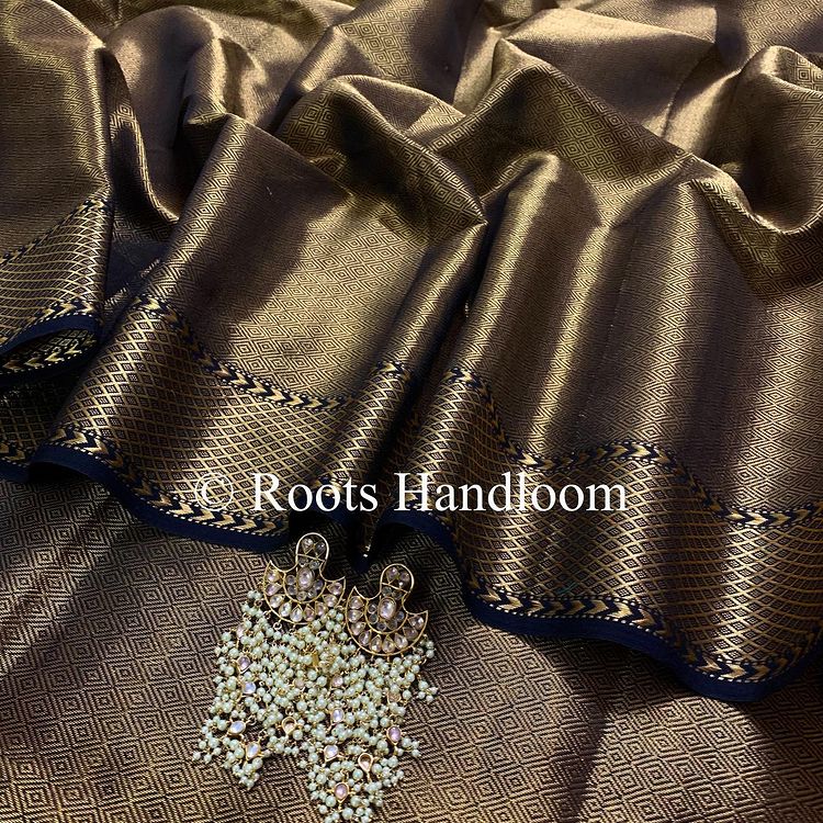 Black and gold Maheshwari with zari pattern all over