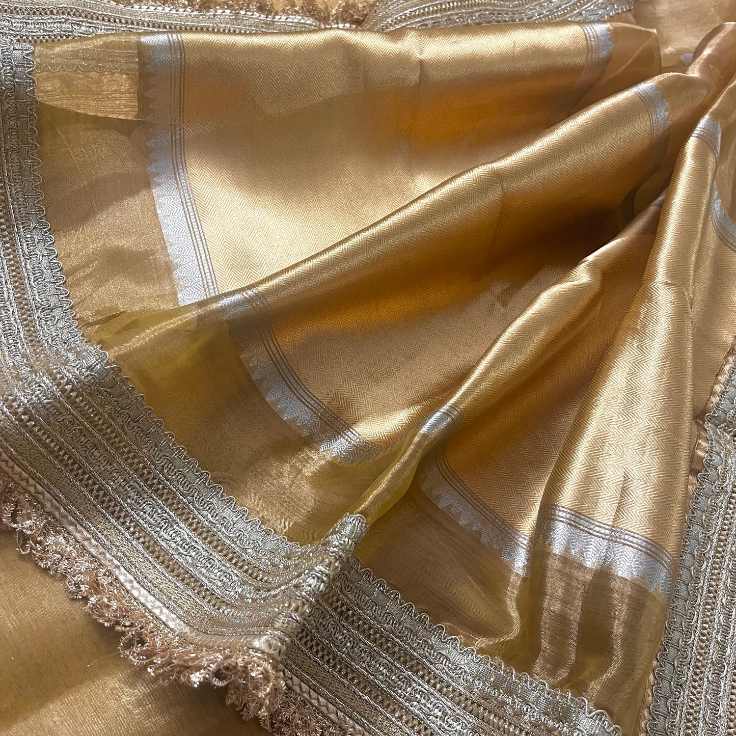 Gold Banarasi tissue silk saree with zari bootis and border