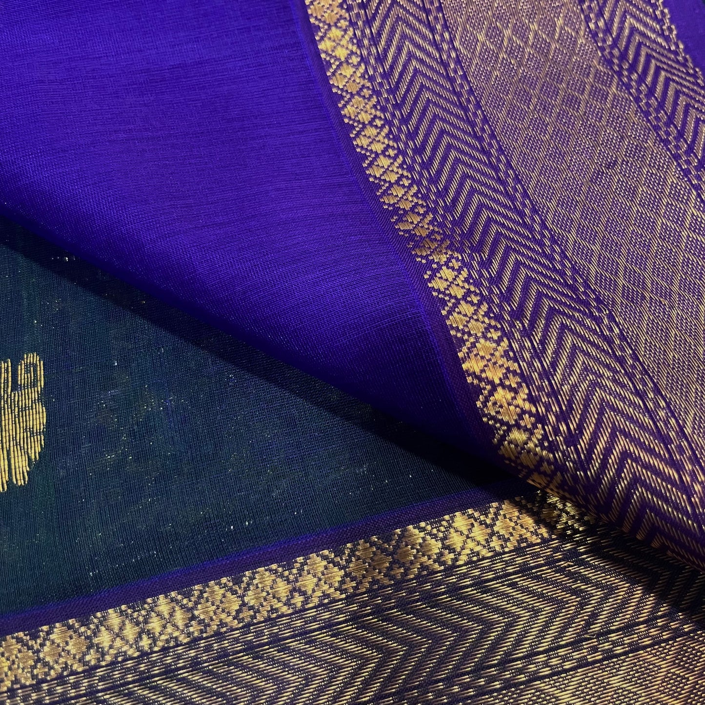 Peacock and purple dual tone Maheshwari saree with zari motifs all over