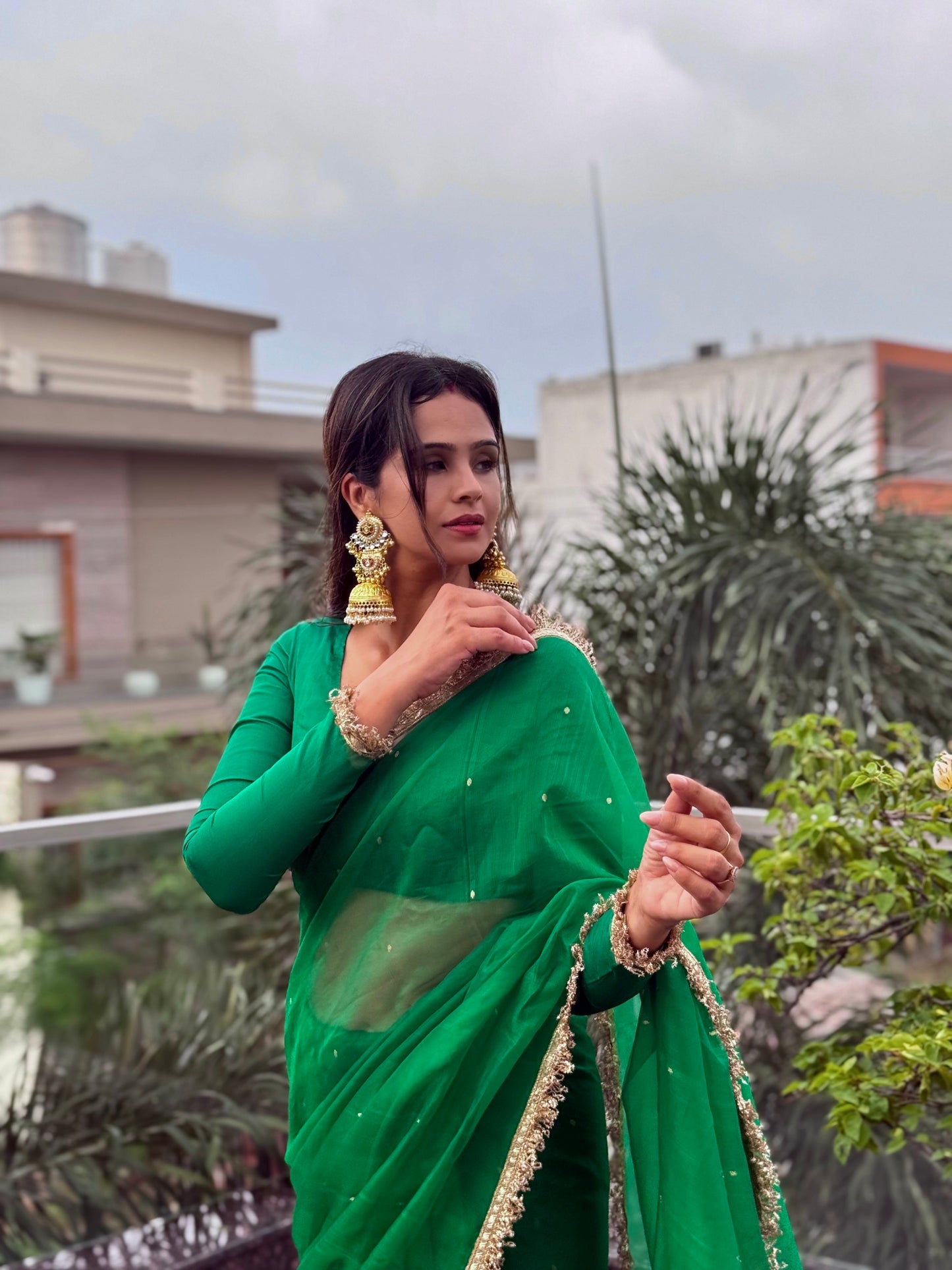 Emerald Green Chanderi silk saree with zari bootis all over