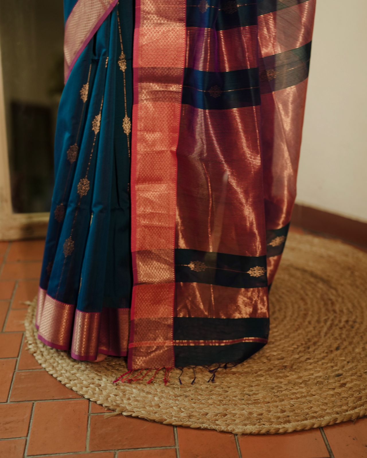 Peacock blue and pink Maheshwari saree with zari motifs all over