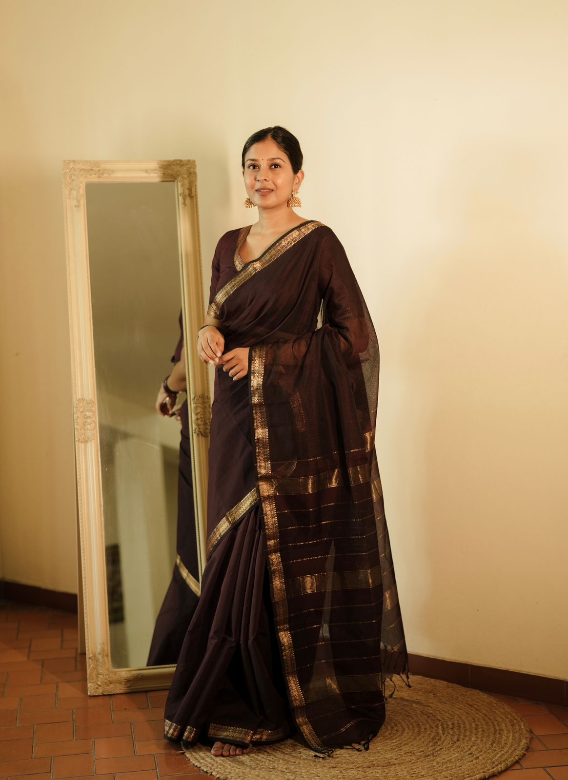 Mahoganay Maheshwari saree with zari border and zari lines on pallu