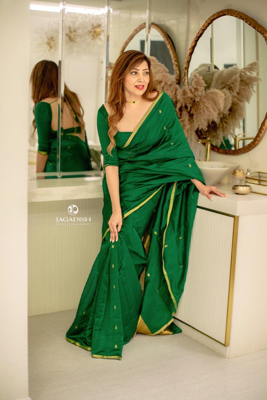 Emerald green chanderi silk saree with flower bootis all over