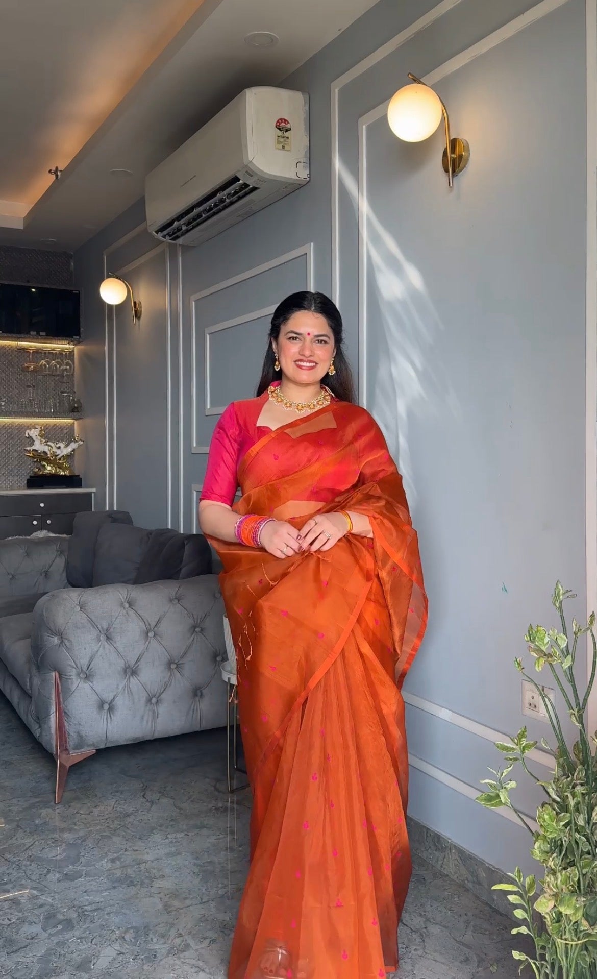 Burnt orange and pink Chanderi silk saree with resham bootis all over