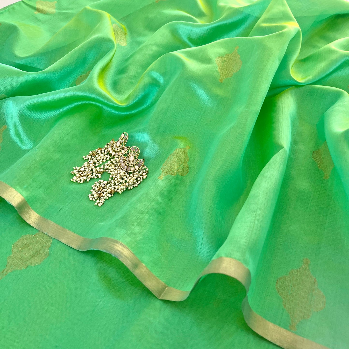 Sea green dual tone Chanderi silk saree with jhoomar motifs all over