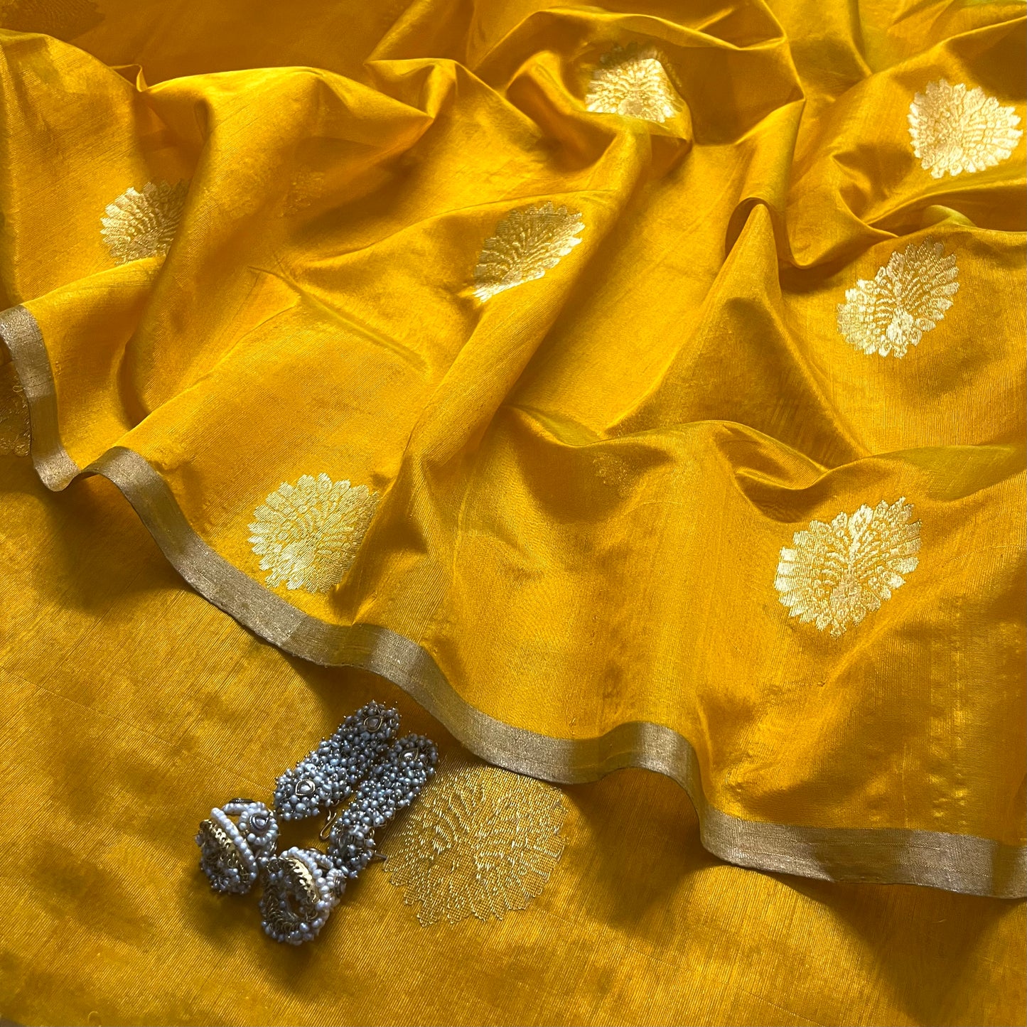 Yellow chanderi silk saree with mor motifs all over
