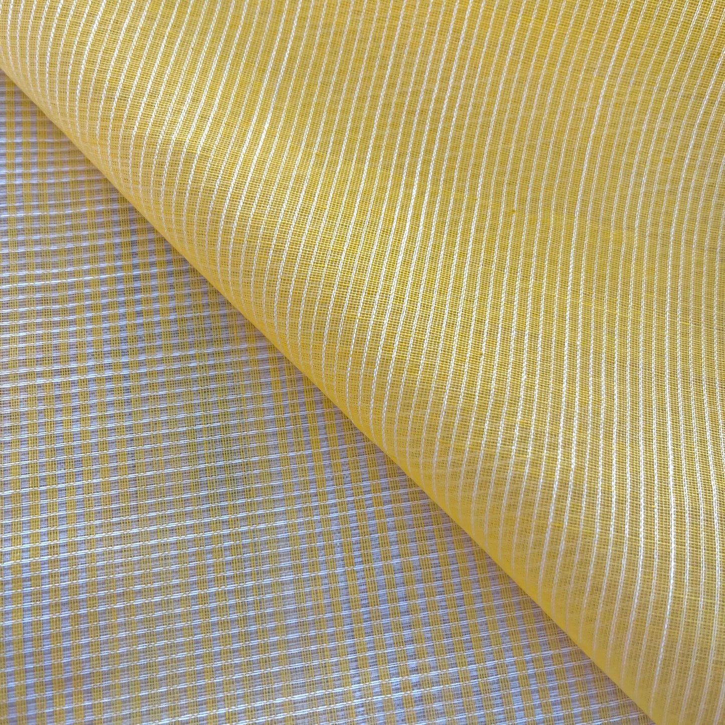 Yellow Maheshwari saree with silver zari border