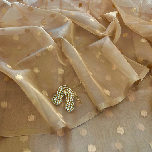 Gold Banarasi tissue silk saree with flower bootis all over
