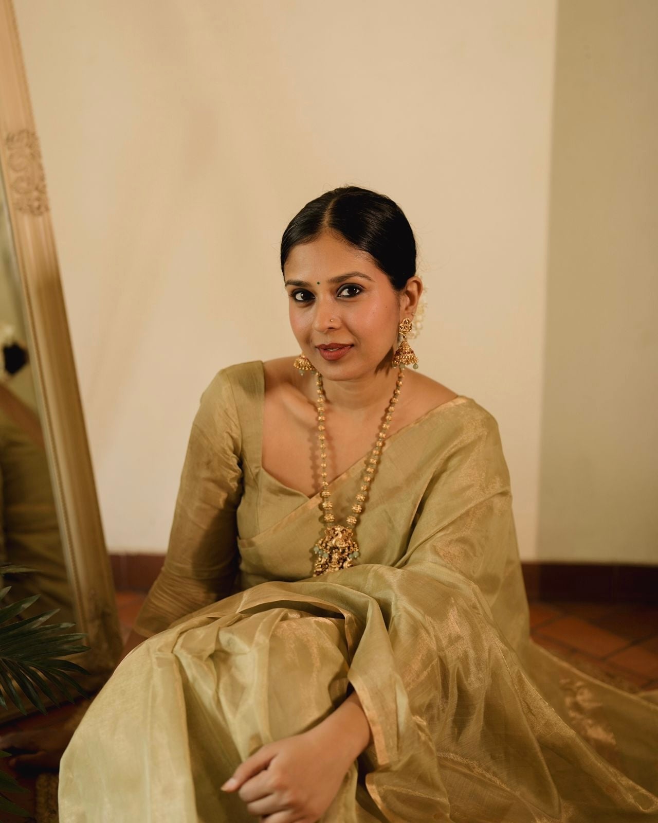 Olive gold Maheshwari tissue silk saree with zari bootis all over