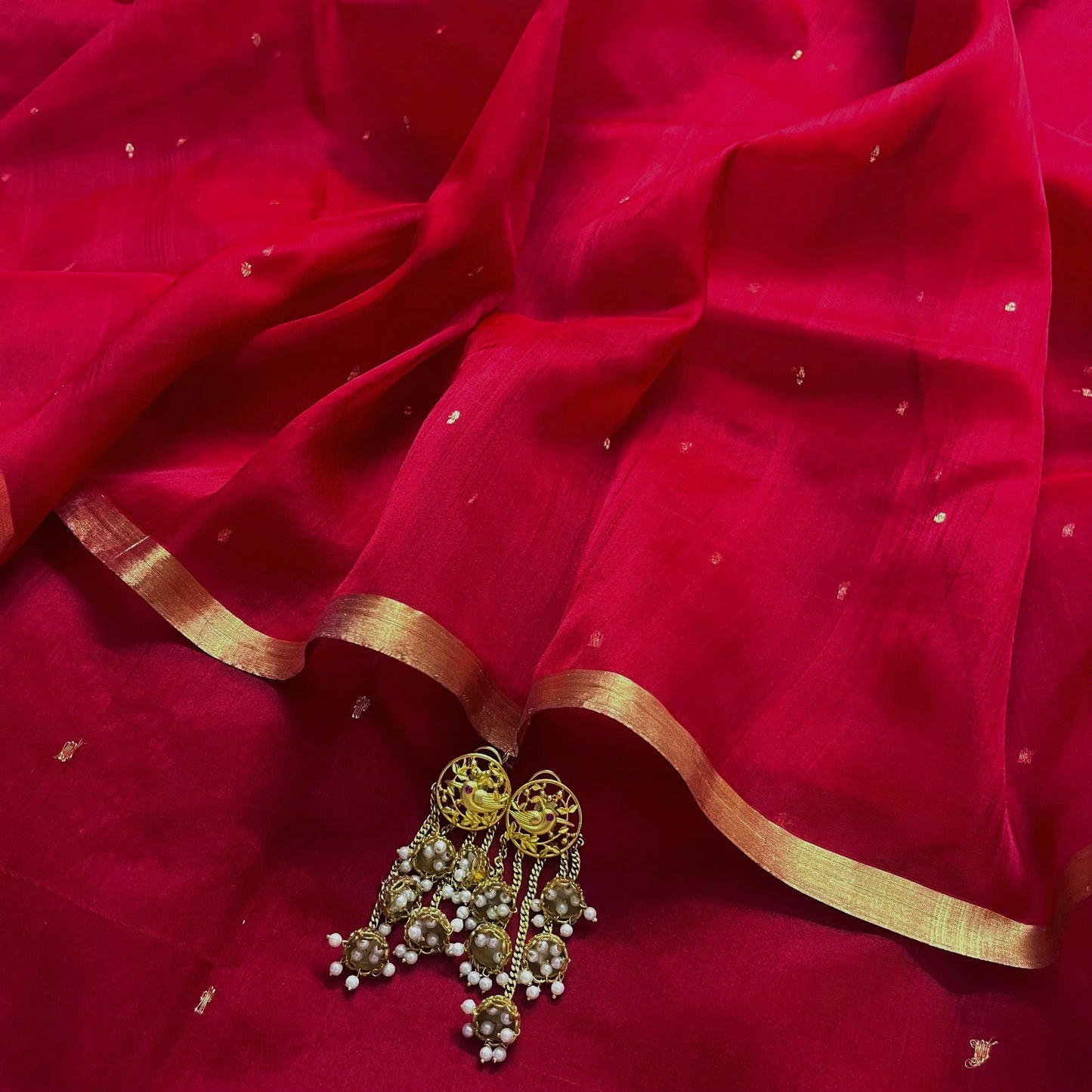 Deep red chanderi organza silk saree with zari bootis all over