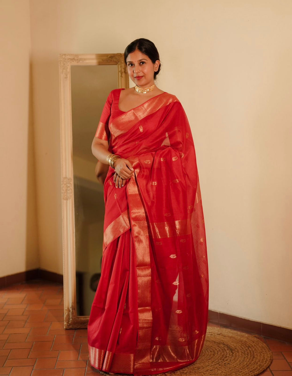 Red Maheshwari saree with morni motifs all over