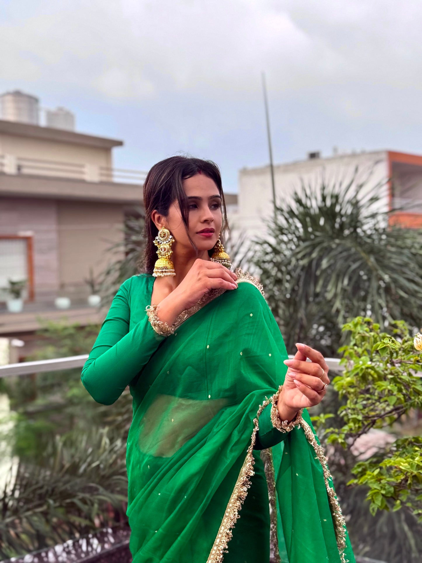 Emerald Green Chanderi silk saree with zari bootis all over