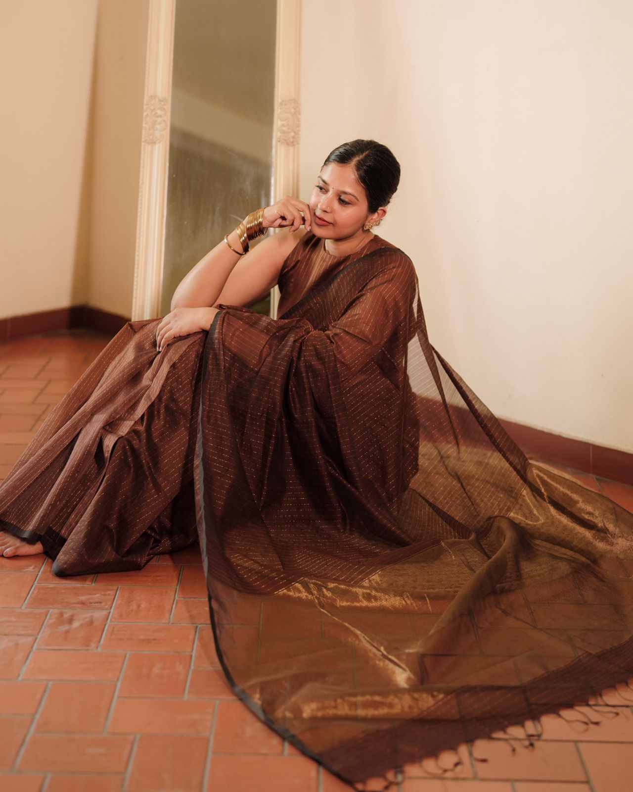 Chocolate brown Maheshwari saree with zari lines all over