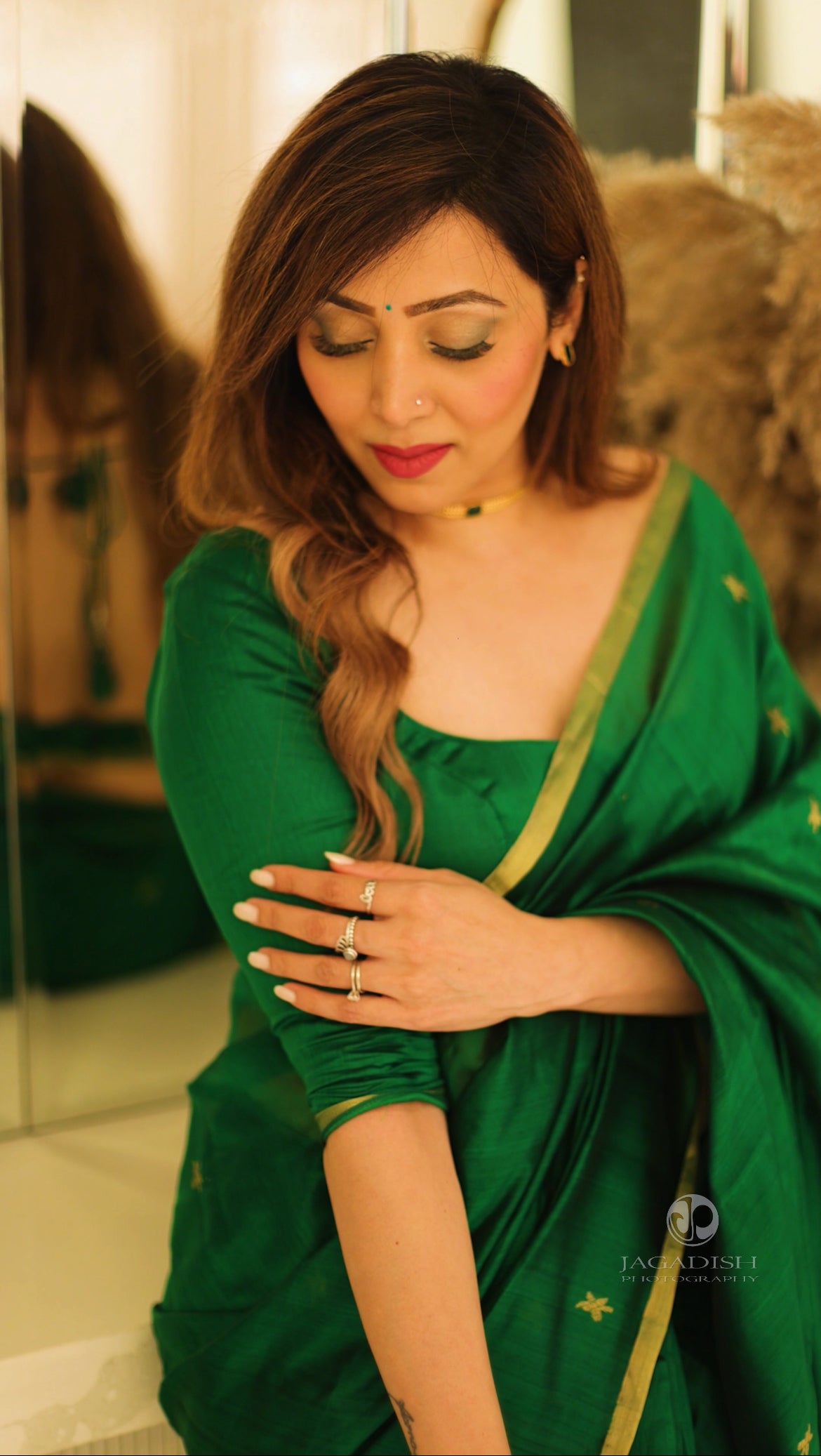Emerald green chanderi silk saree with flower bootis all over