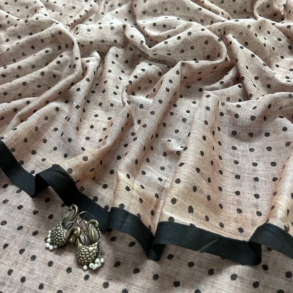 Greyish beige and black polka dot mulmul saree