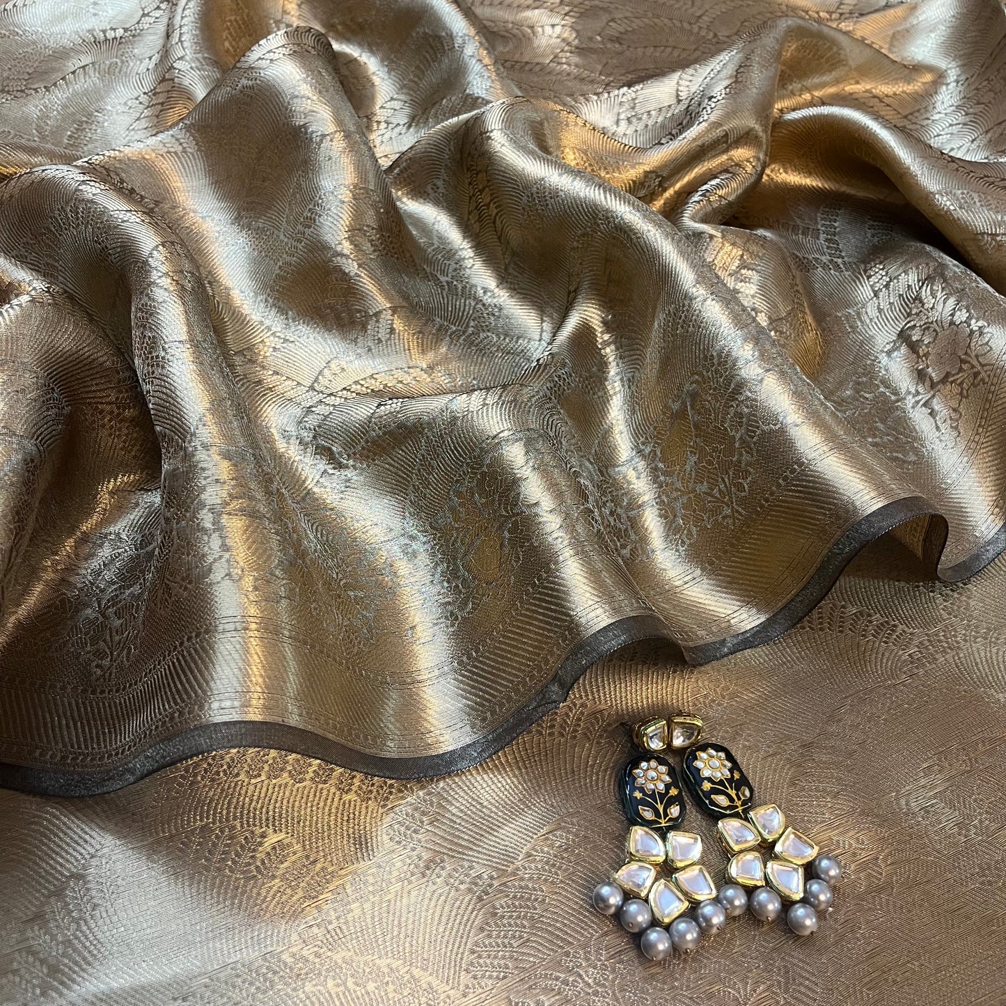 Antique gold Banarasi brocade silk saree with zari pattern all over