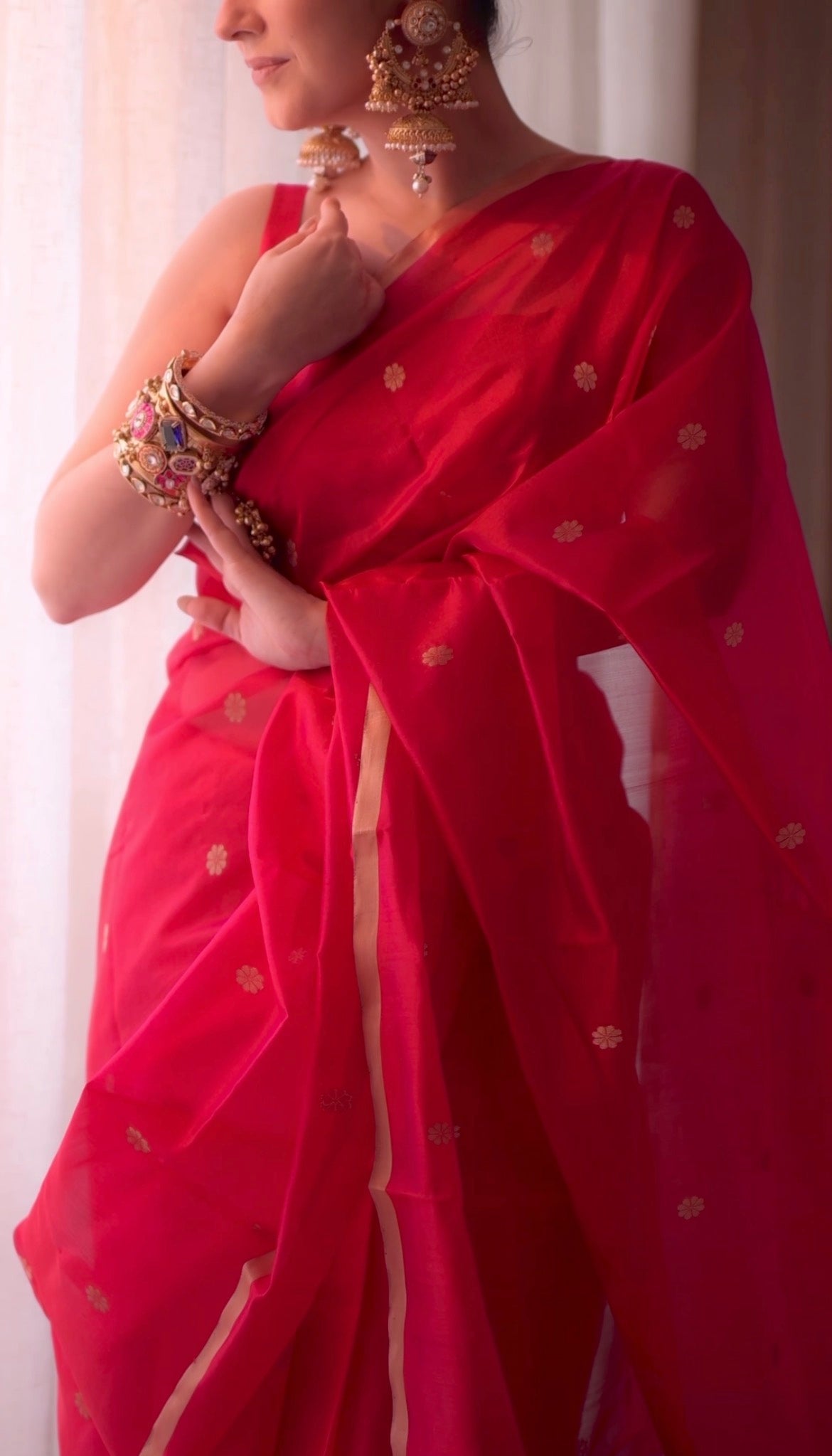 Red and pink dual tone Chanderi silk saree with flower bootis all over