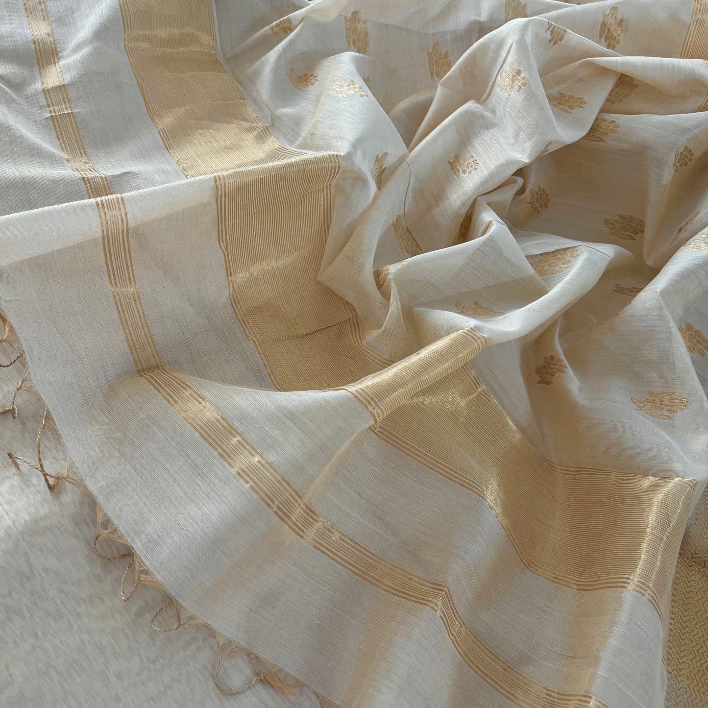 Cream gold Maheshwari tissue silk saree with flower motifs all over