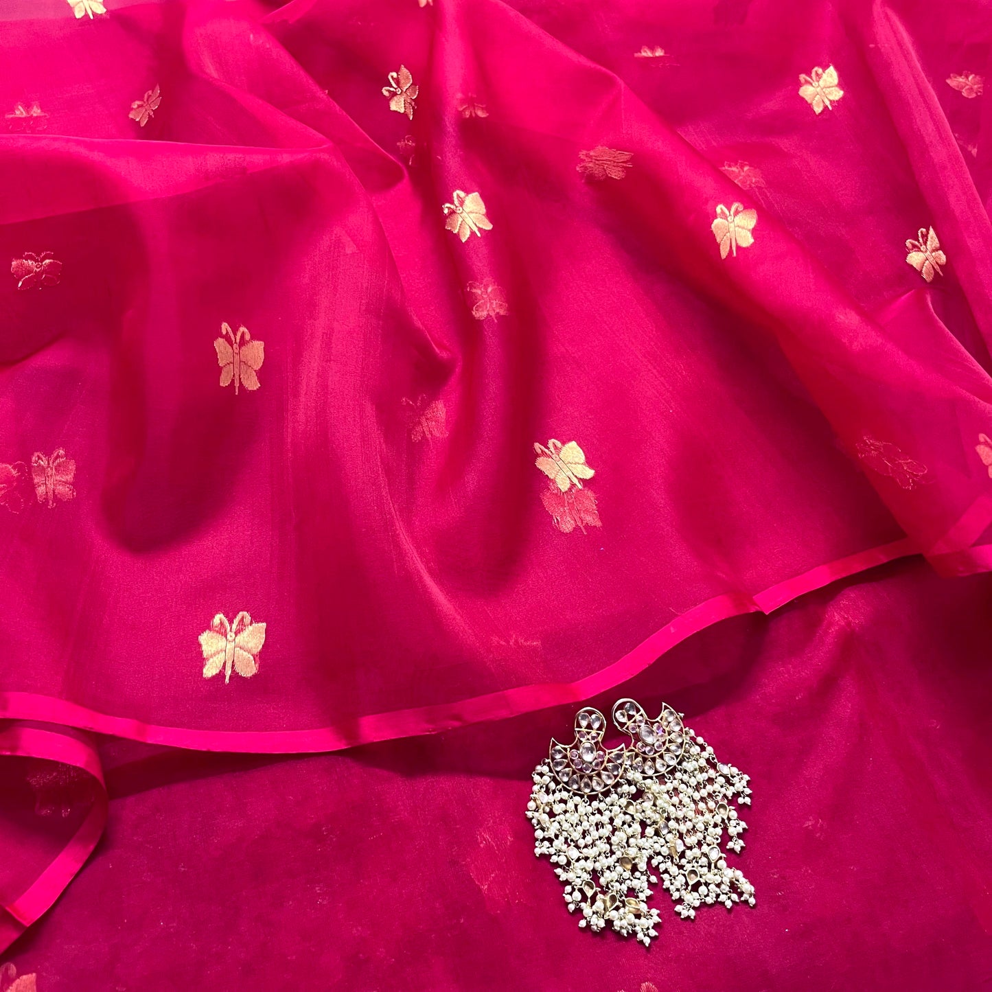 Rani pink Chanderi silk saree with butterfly motifs all over