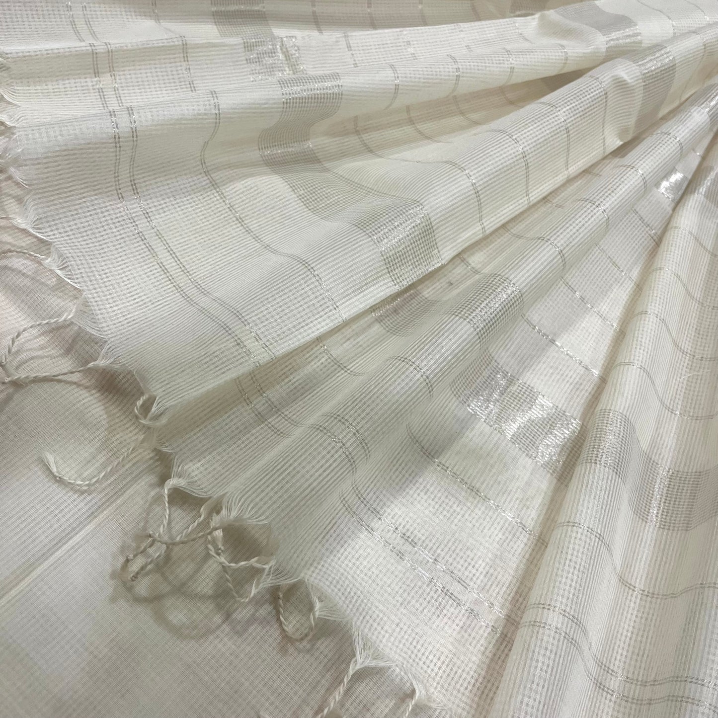 White Maheshwari saree with zari border and zari lines on pallu