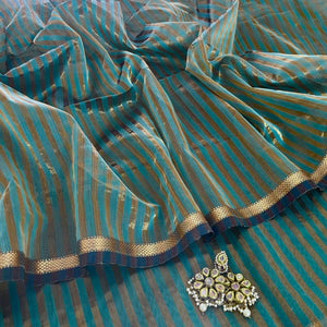 Baby blue Maheshwari saree with zari stripes all over