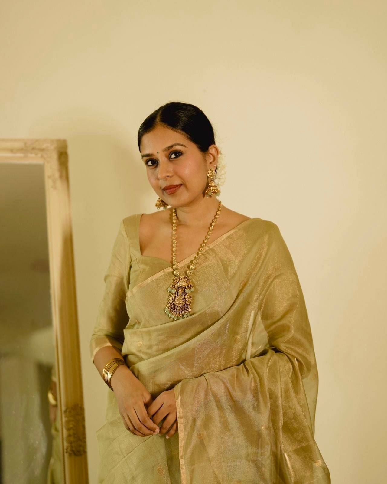Olive gold Maheshwari tissue silk saree with zari bootis all over