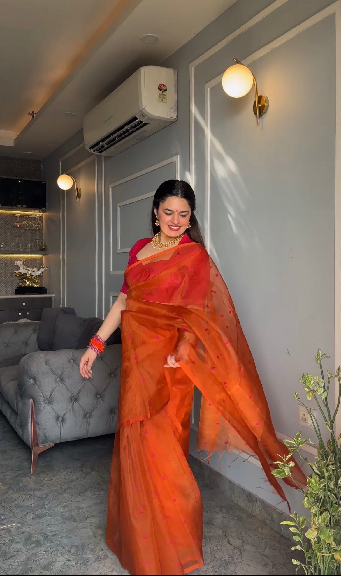 Burnt orange and pink Chanderi silk saree with resham bootis all over