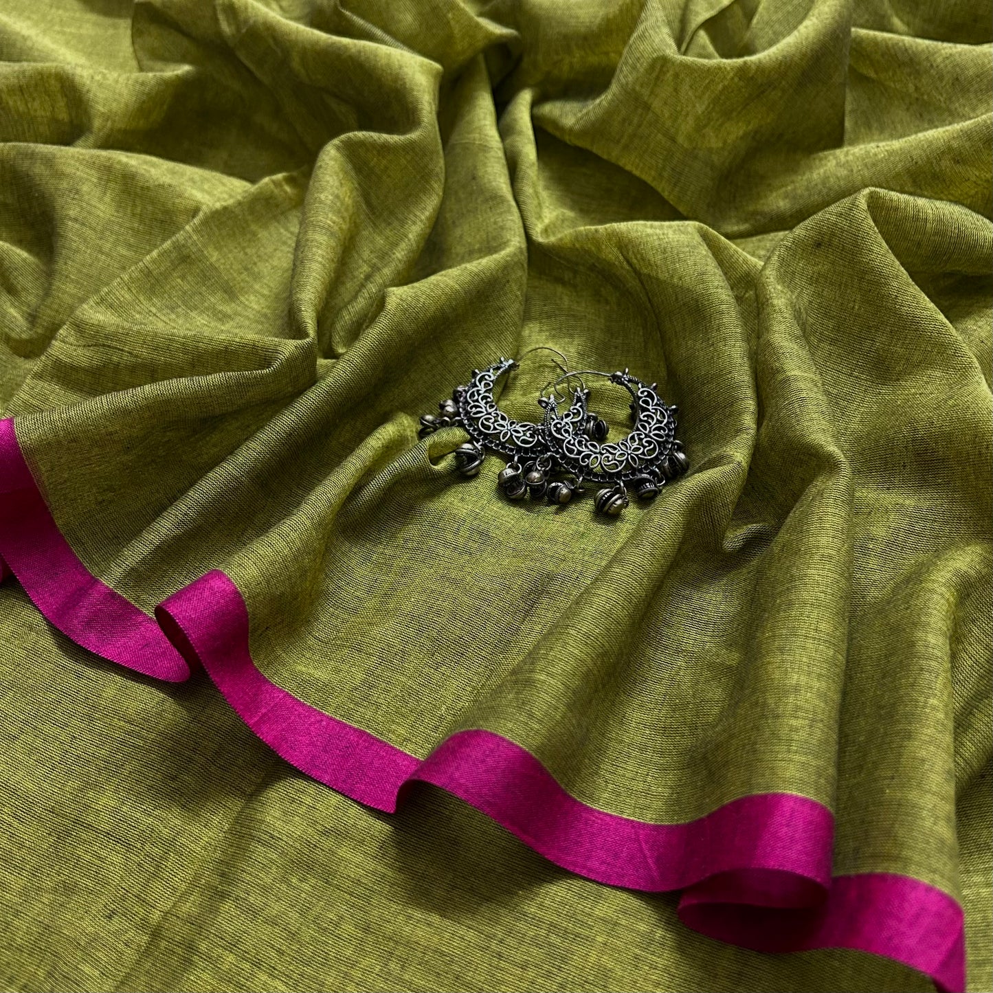 Olive green and pink mulmul saree