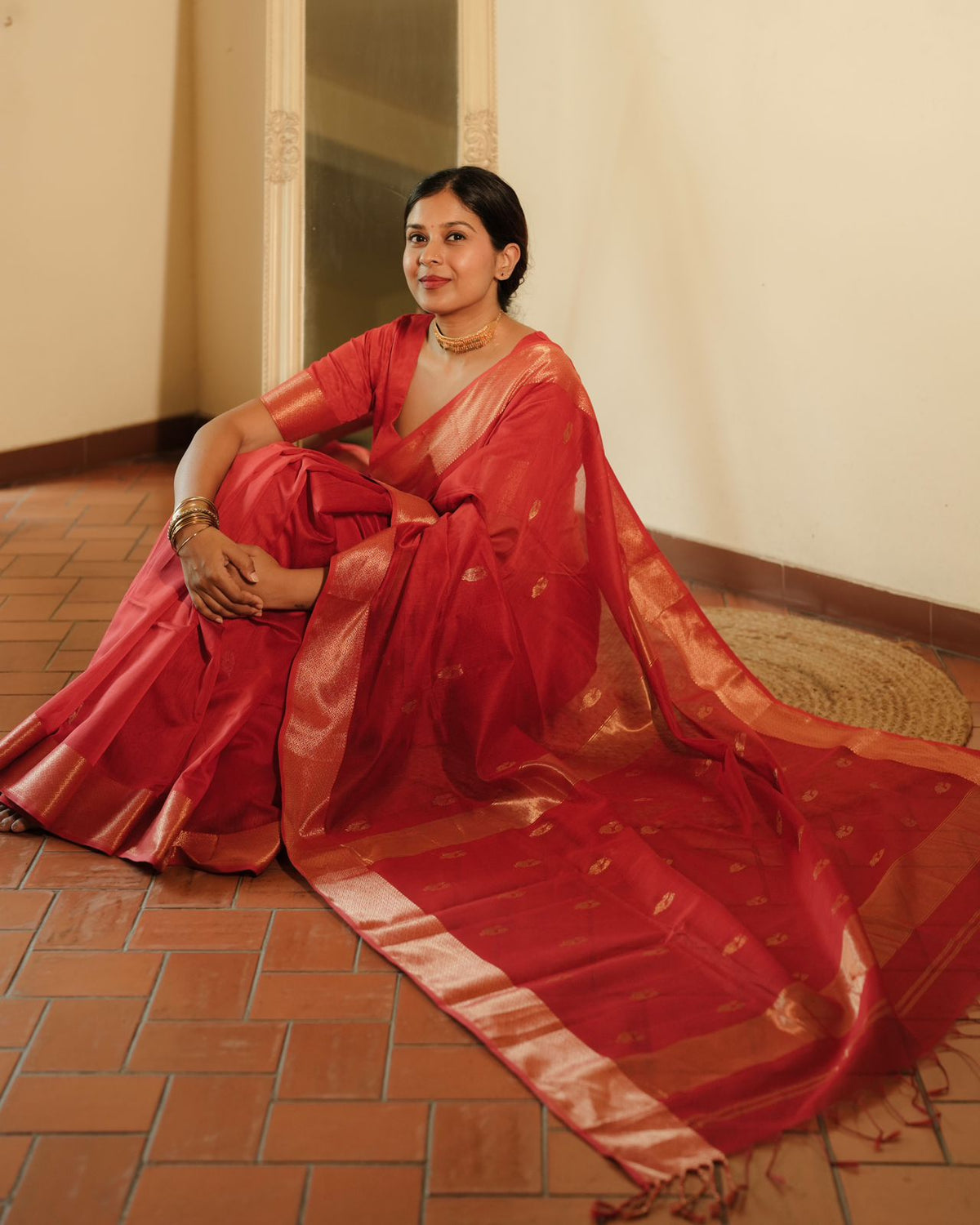 Red Maheshwari saree with morni motifs all over