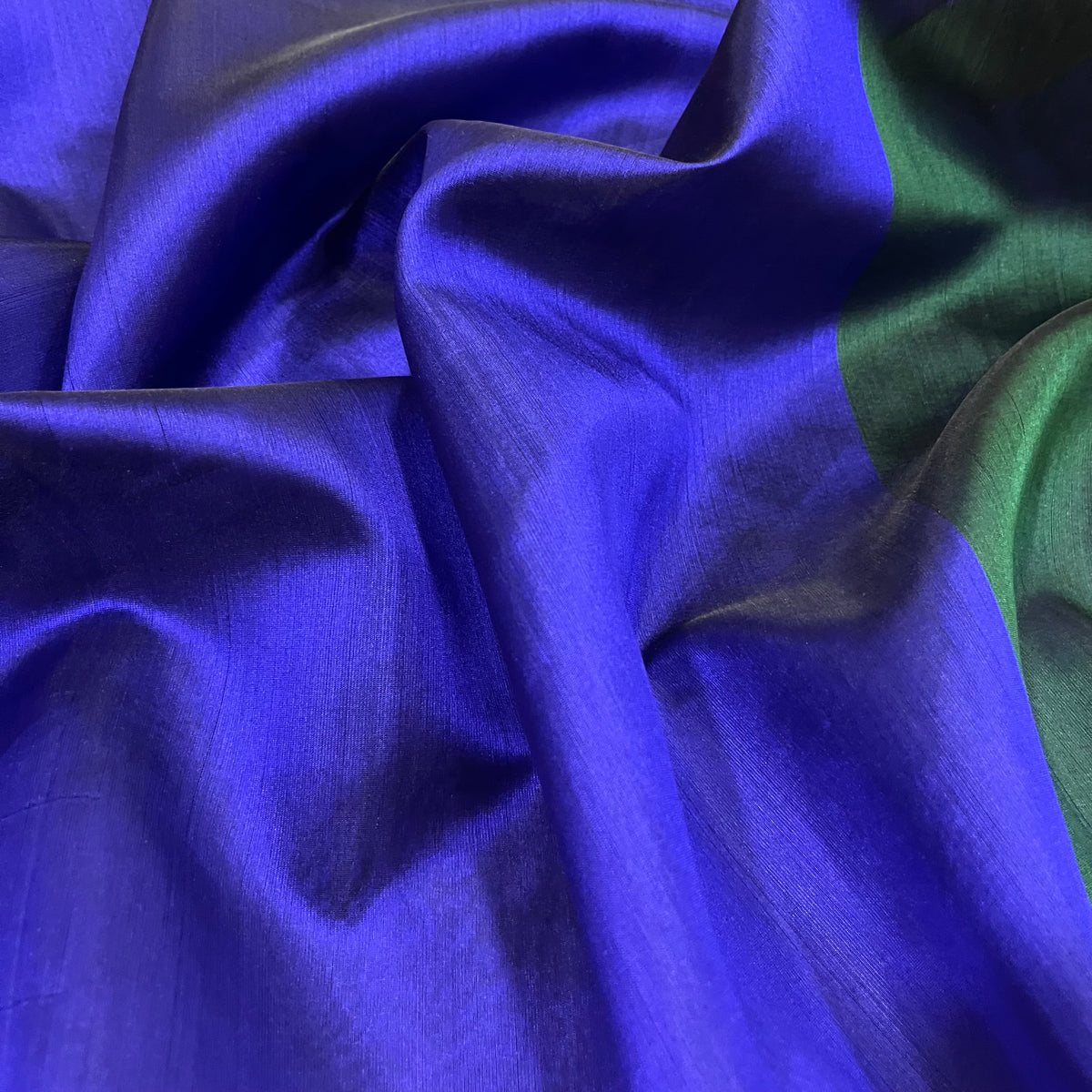 Indigo and green Chanderi silk saree with zari border