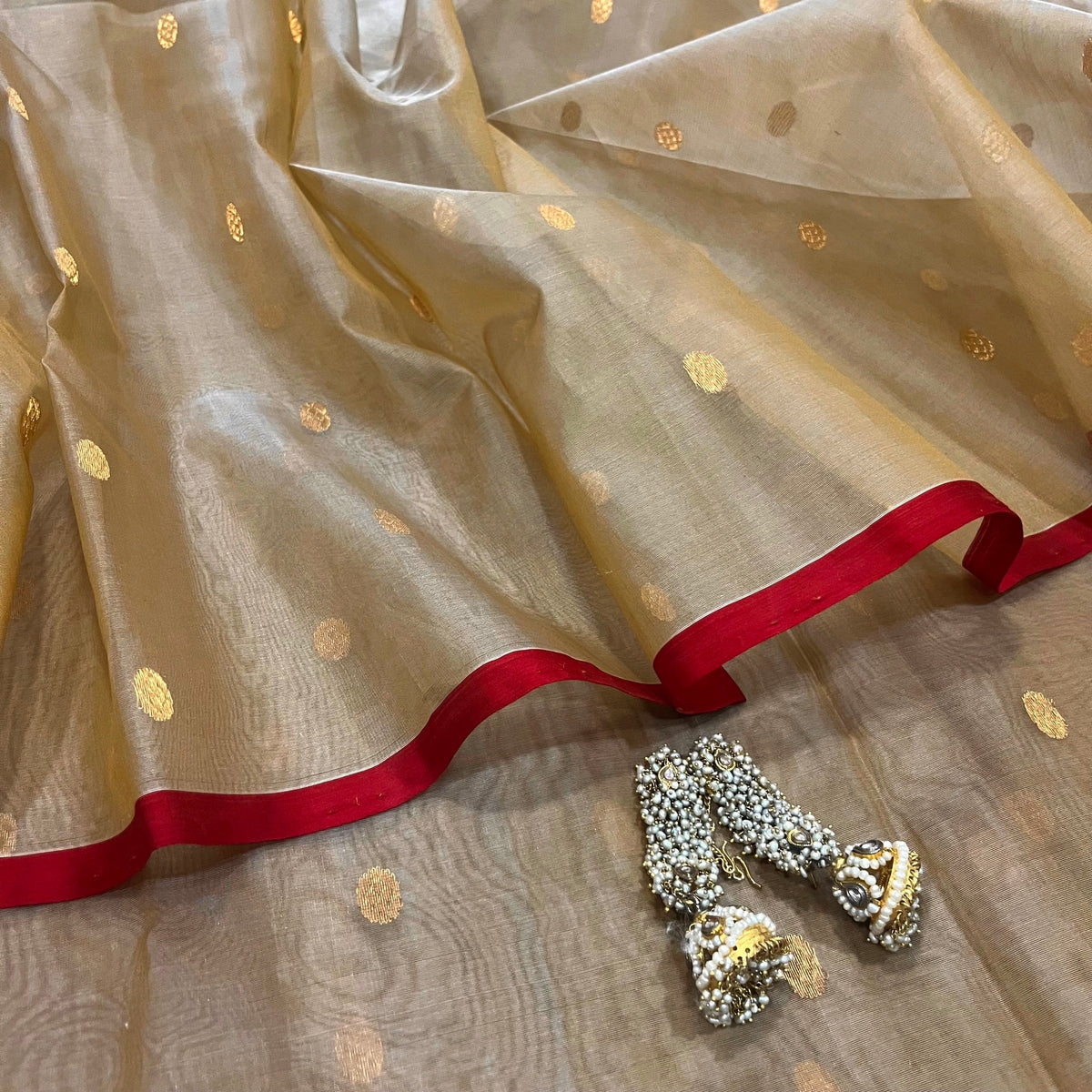 Beige gold and red Chanderi silk saree with zari bootis all over