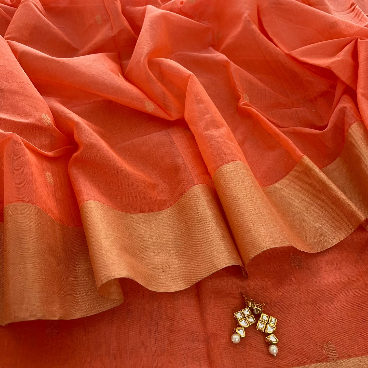 Peachish pink Chanderi saree with zari pattern on pallu