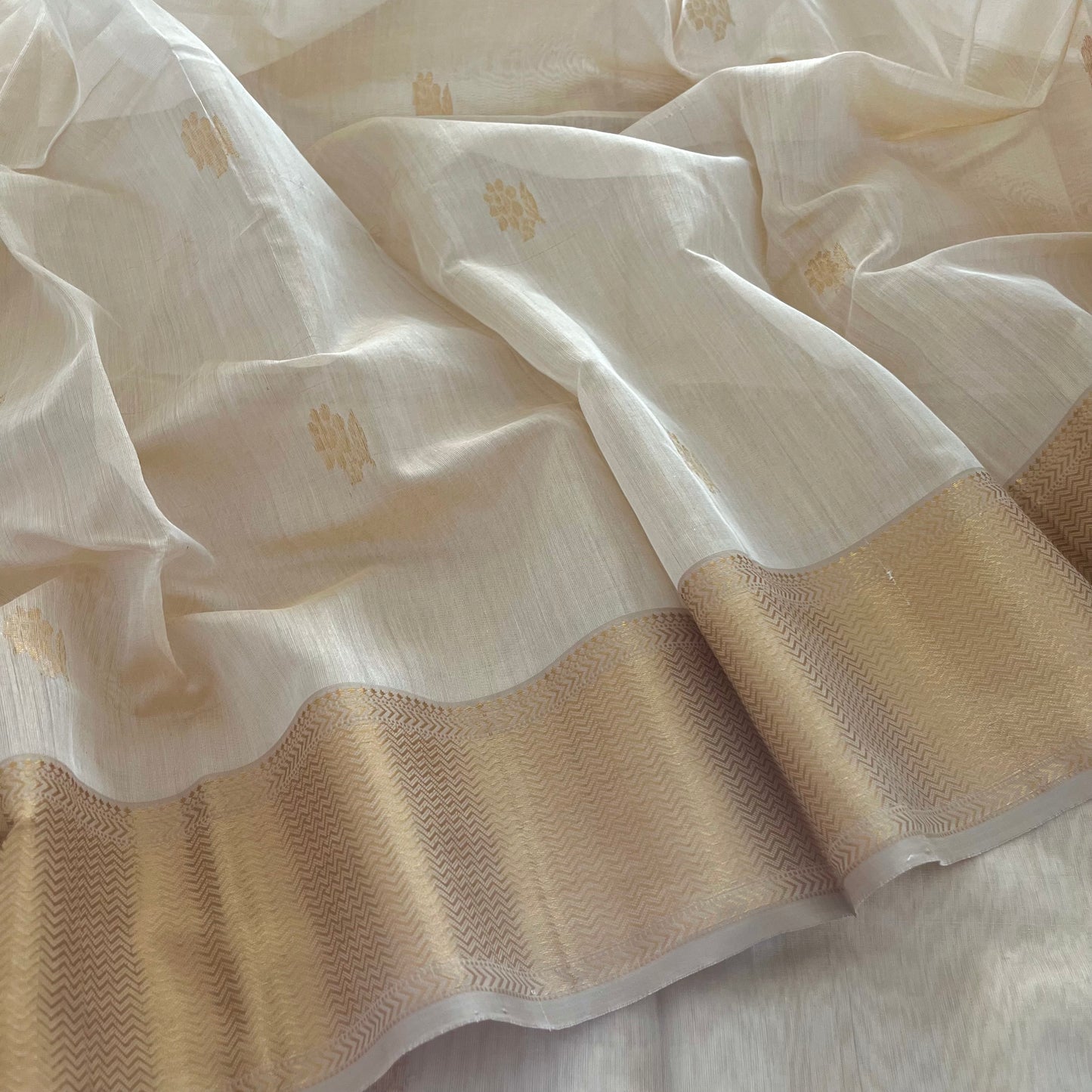 Cream gold Maheshwari tissue silk saree with flower motifs all over