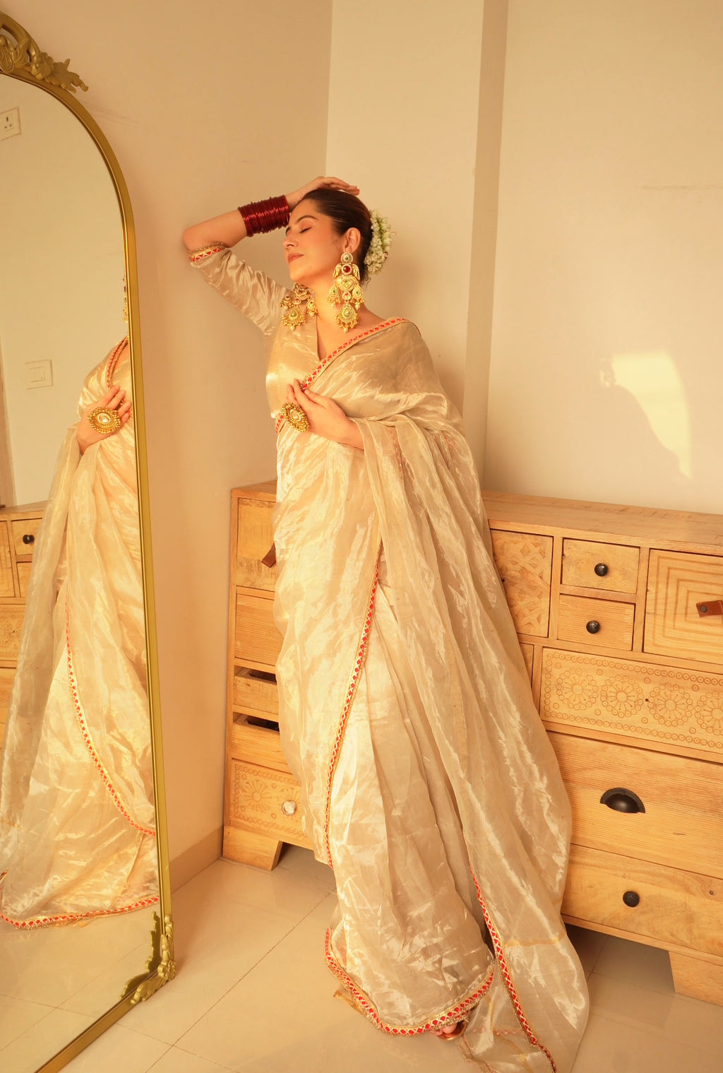 Chantilly cream and red Chanderi tissue silk saree with zari bootis all over