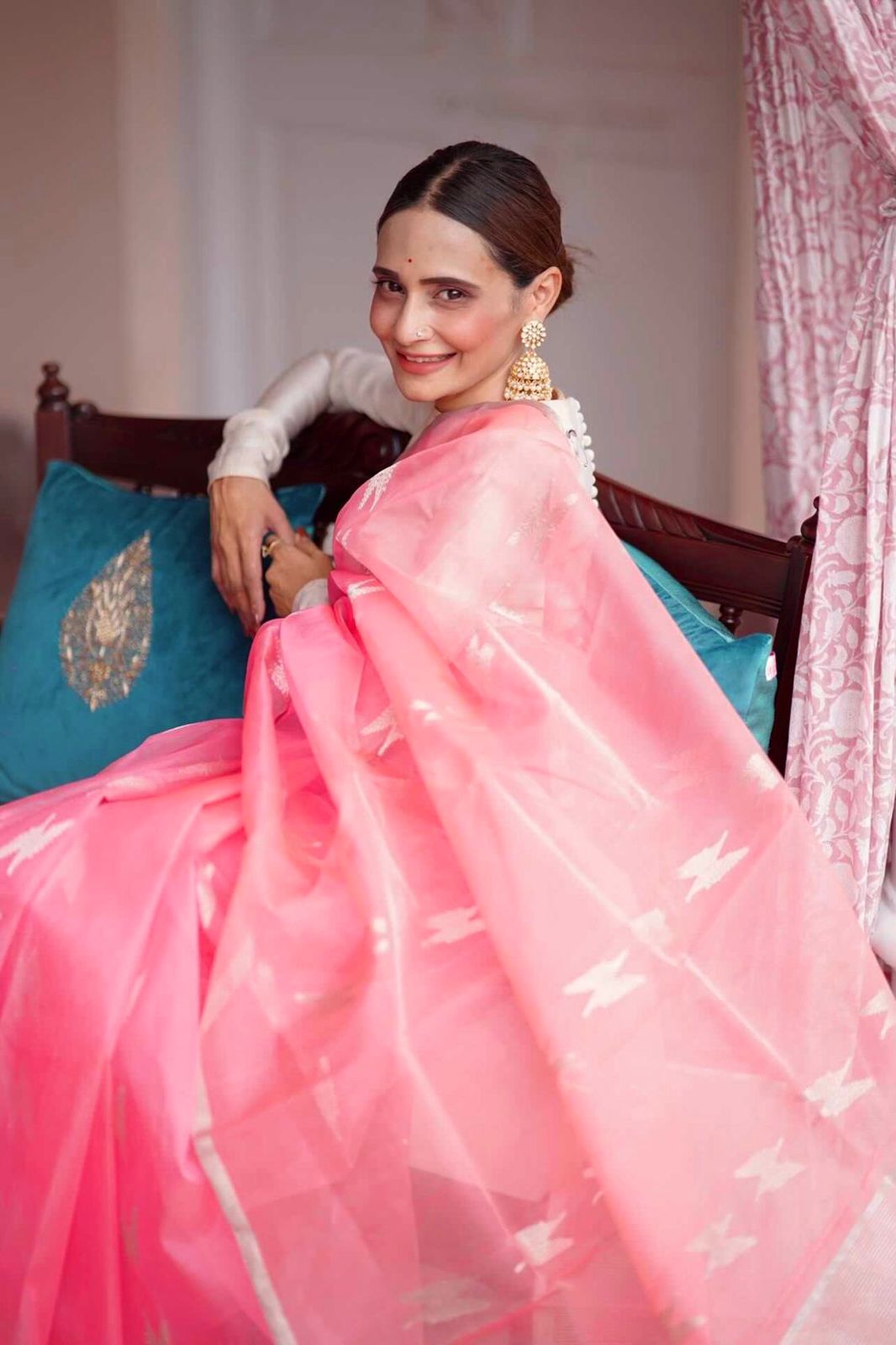 Peachish pink Chanderi organza silk with feather motifs all over