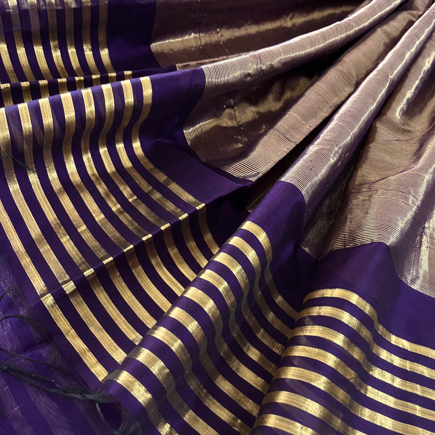 Dark purple and gold Maheshwari saree with zari stripes all over