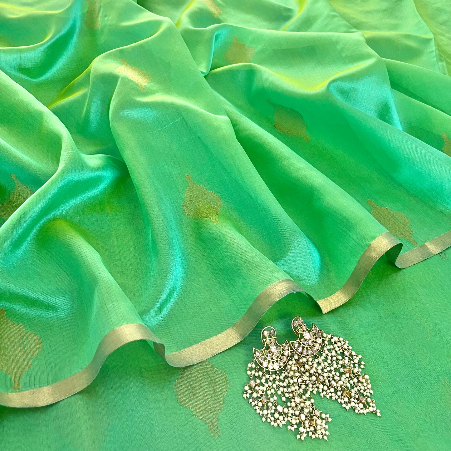 Sea green dual tone Chanderi silk saree with jhoomar motifs all over