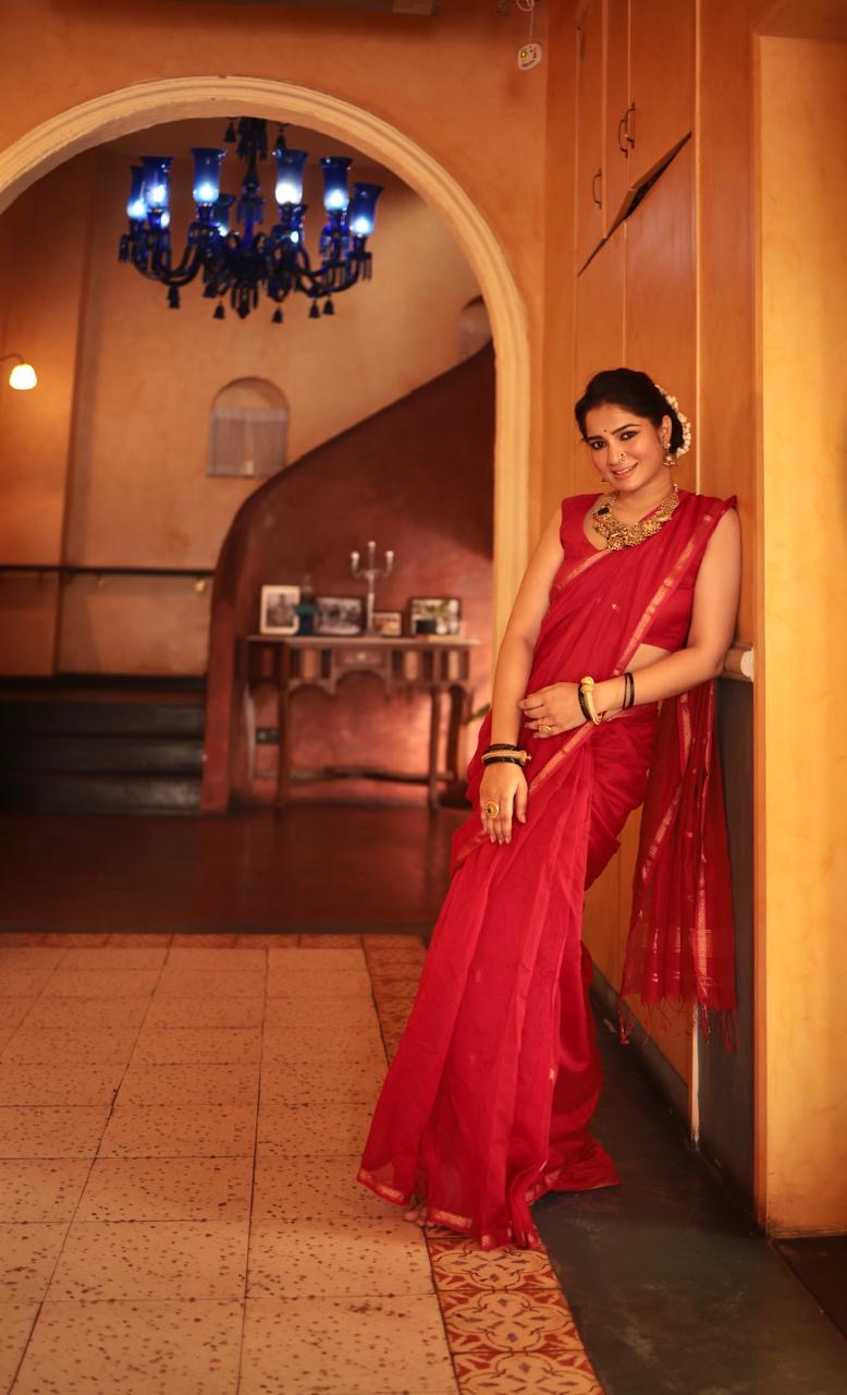 Red maheshwari saree with zari border & zari bootis all over